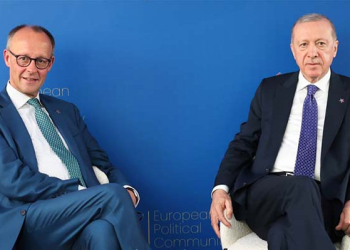 Erdoğan, Almanya Başbakanını uyardı